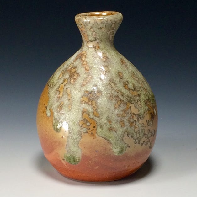 An amazing convergence of ash and glaze flowing through a vibrant bulbous landscape of yellow gold and emerald drips.  Unless otherwise noted, all stoneware and porcelain is food safe, dishwasher safe, microwave save. Hand washing recommended.