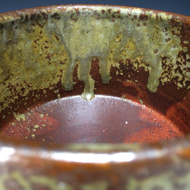 Another more straight walled shaped combination shino with ash. Great balance and diversity to this work. A shorter foot. Feels at home in the hands.  Unless otherwise noted, all stoneware and porcelain is food safe, dishwasher safe, microwave save. Hand washing recommended. 